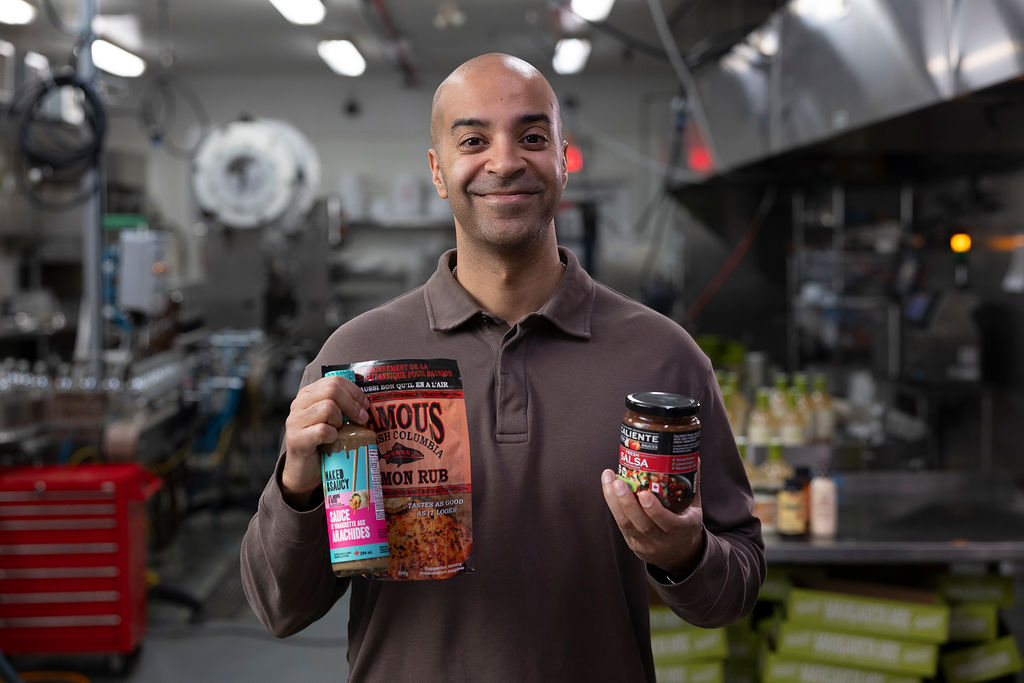 Hummingbird Foods founder holding products